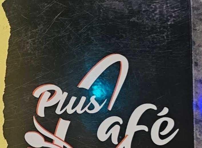 Plus Café sign on Washington St